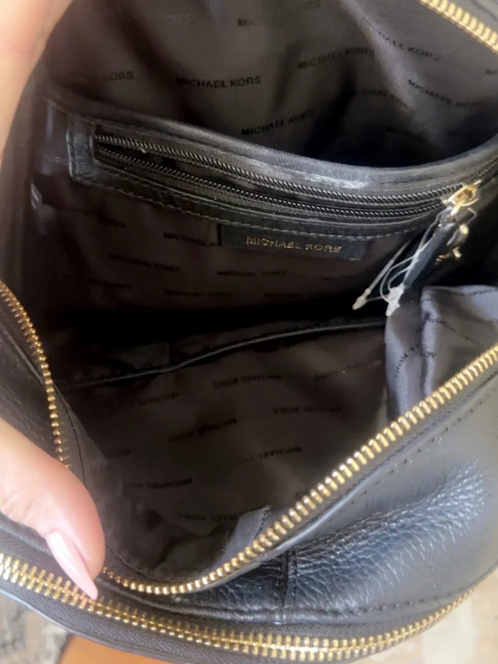 Michael Kors Black Leather Backpack with Gold Hardware Accents